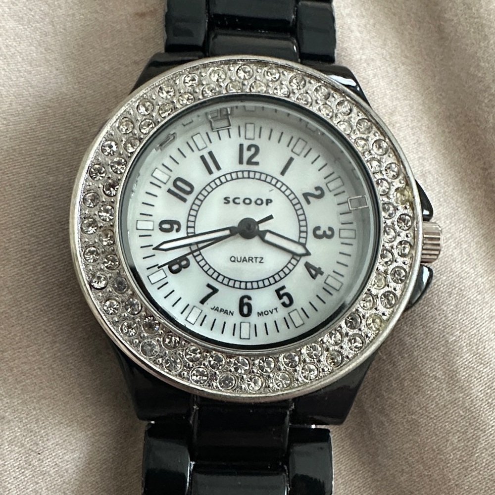 Scoop Black and Silver Watch with Crystal Accents. Band is ceramic.